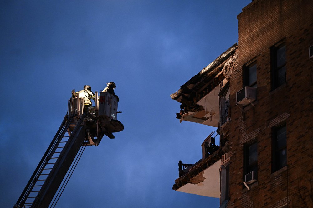 Emergency responders, firefighters respond after a partial building collapse in the Bronx.