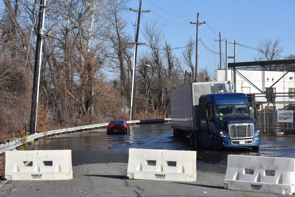 A view of the aftermath of flooding after a rainstorm and overflow of the Passaic River left cars stranded, streets flooded and homes damaged by water in Paterson, N.J. on Dec. 21, 2023.