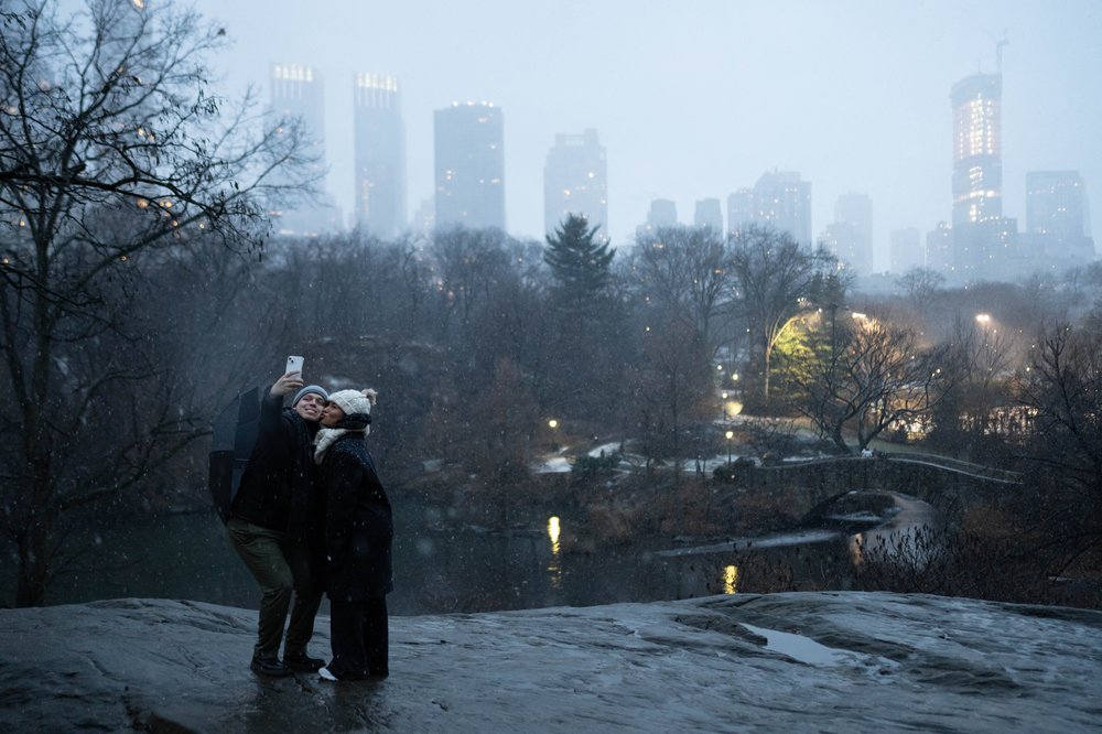 A couple takes a selfie during a snow storm in Central Park on Jan. 6, 2024.