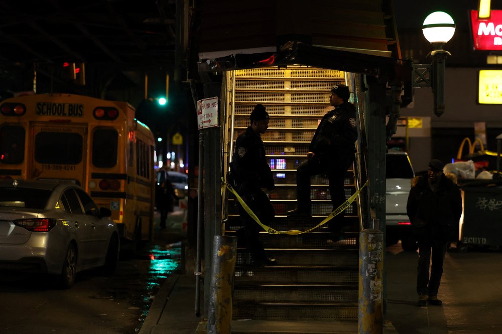 Police block off an entrance to the Mt. Eden Avenue subway station in the Bronx borough of New York after a different shooting February 12.