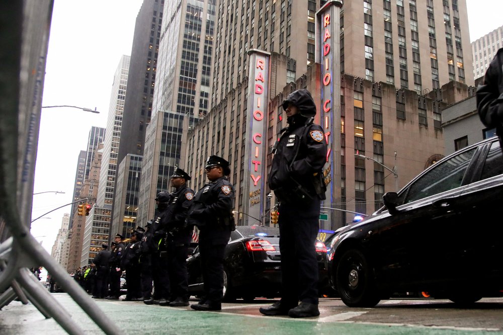 Police officers this spring, providing security as pro-Palestinian demonstrators gather for the "Flood Manhattan for Gaza" rally outside Radio City Music Hall.