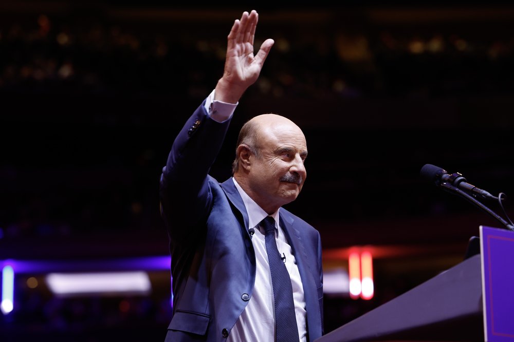 Dr. Phil at a podium.
