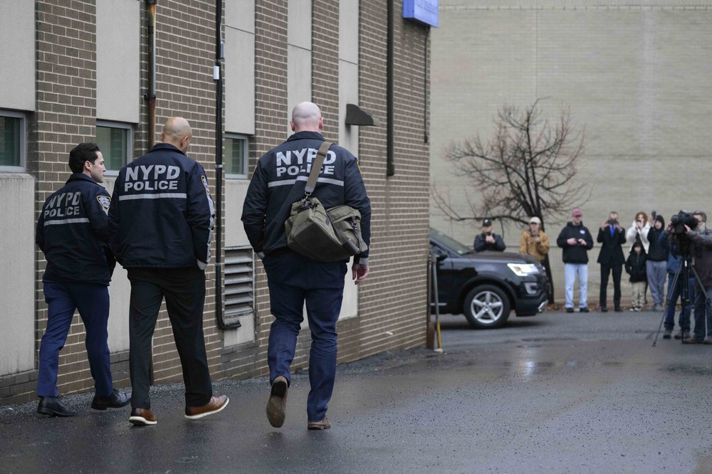 Members of the New York Police Department enter the Altoona Police Department on Dec. 9, 2024 in Altoona, Pennsylvania.