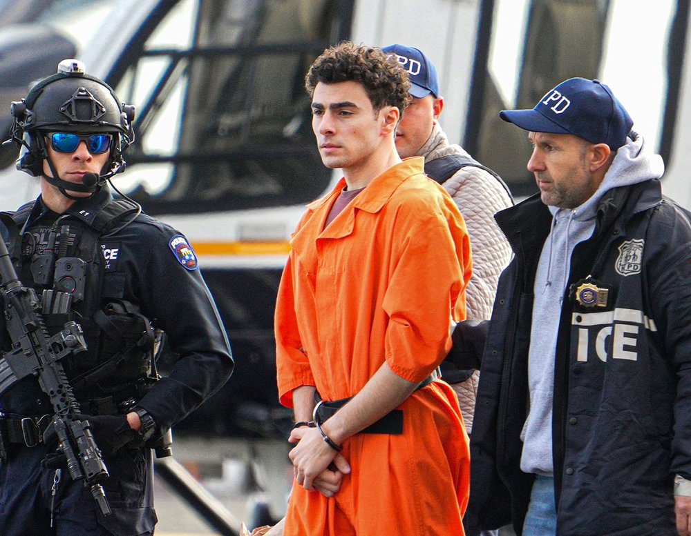 NEW YORK, NY - DECEMBER 19: Luigi Mangione, the suspect indicted in the murder of UnitedHealthcare CEO Brian Thompson, is seen arriving at the South Street Helipad in New York City on December 19, 2024 after being extradited from Pennsylvania.