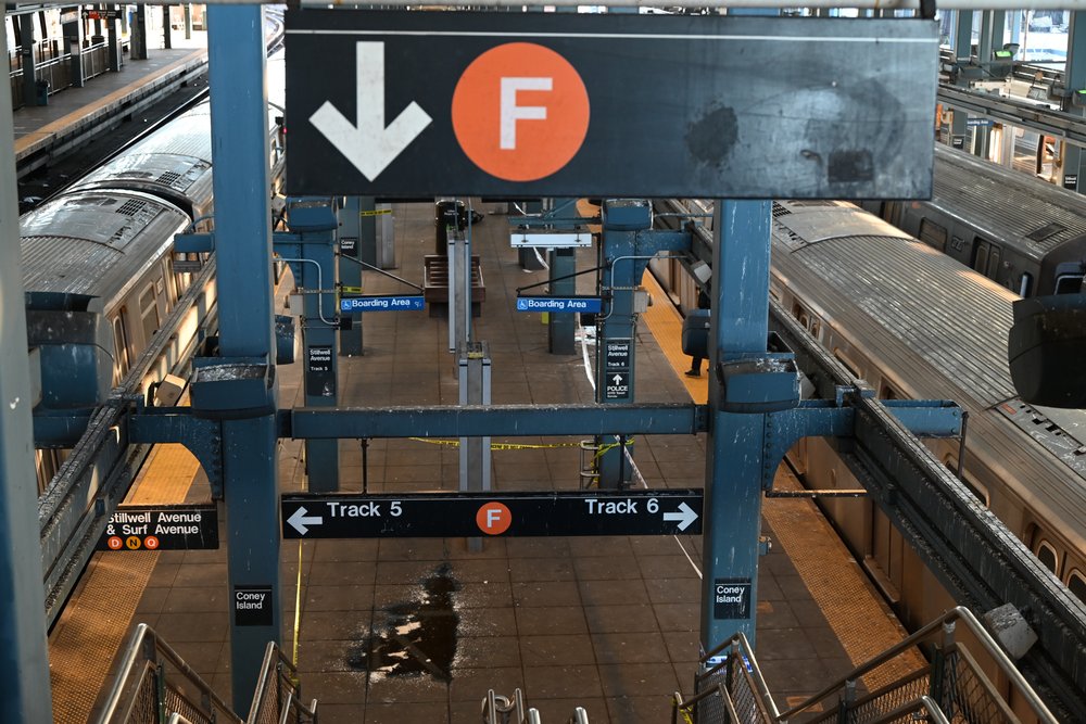 A view from the scene where a woman died after being lit on fire by a man aboard an MTA subway train as she slept at the Coney Island-Stillwell Avenue subway station in the Coney Island section of Brooklyn, New York, United States on Sunday, December 22, 2024.