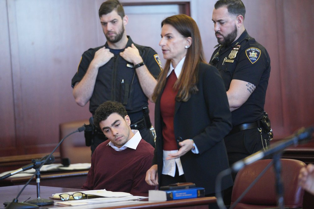 Luigi Mangione appears with his attorney Karen Friedman Agnifilo for his arraignment at Manhattan Criminal Court on December 23, 2024 in New York City.