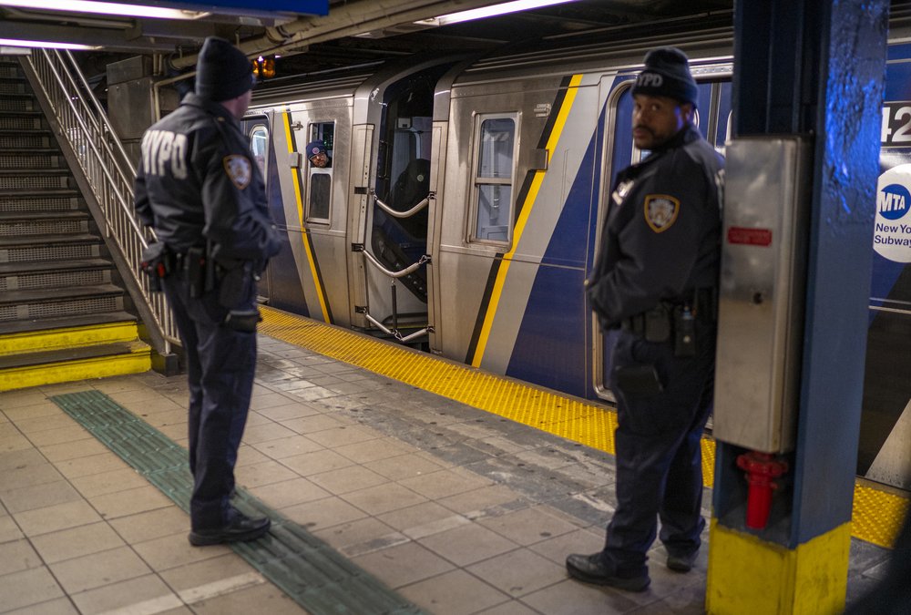 NYPD officers stand on a subway station platform in New York City on Jan. 17, 2025.