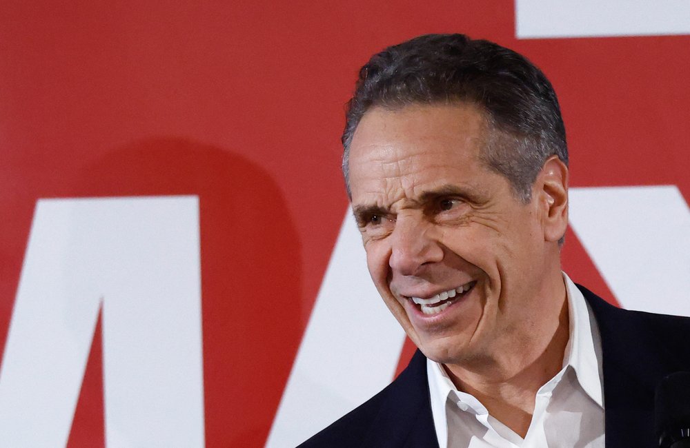 andrew cuomo on a red background
