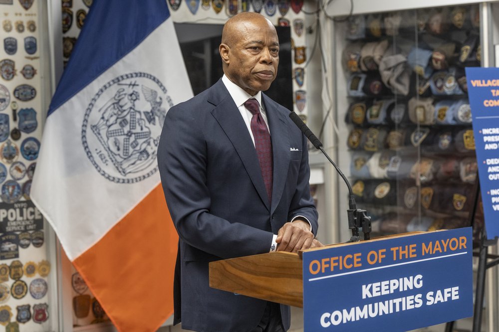 New York City Mayor Eric Adams at a podium
