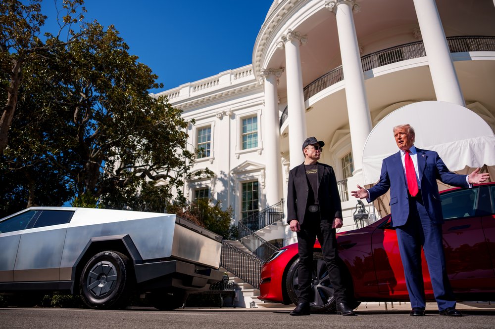 Trump and Elon Musk beside a Tesla cyber truck at the White House.