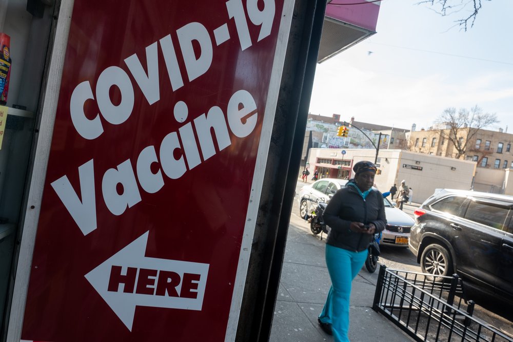 A pharmacy advertises the COVID-19 vaccine as the nation marked the fifth anniversary of the Covid-19 pandemic on March 13, 2025, in New York City.
