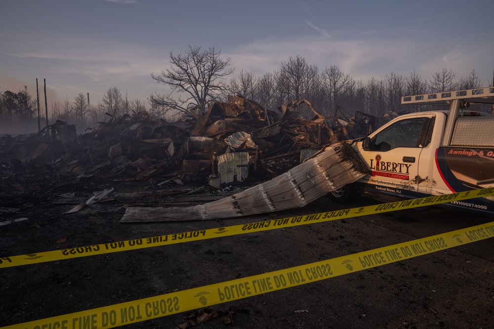 The remains of Liberty Overhead Door and Awning, destroyed by a wildfire on April 24