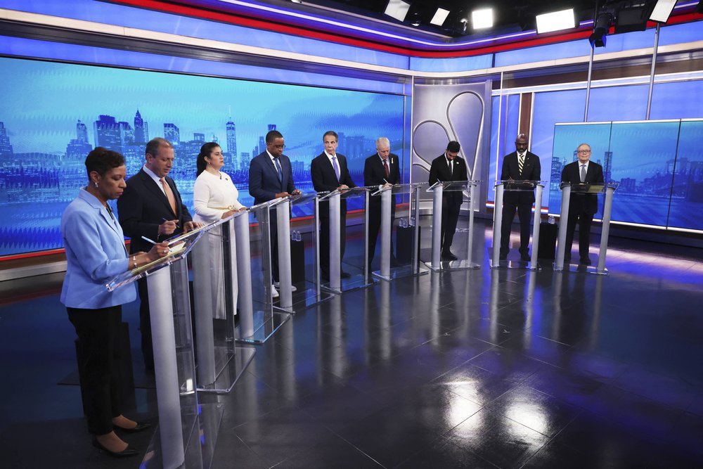 Candidates Adrienne Adams, Brad Lander, Jessica Ramos, Zellnor Myrie, Andrew Cuomo, Whitney Tilson, Zohran Mamdani, Michael Blake and Scott Stringer participate in a Democratic mayoral primary debate, at NBC's 30 Rockefeller Center studios in New York on June 4, 2025.