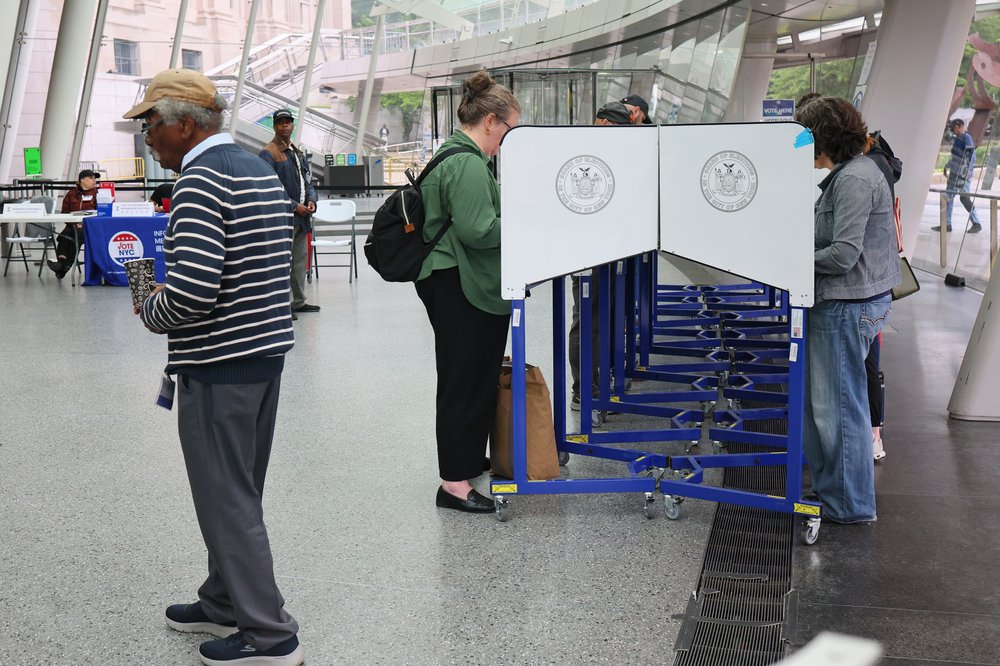 Voters vote early in New York City's primary election at the Brooklyn Museum on June 17, 2025.