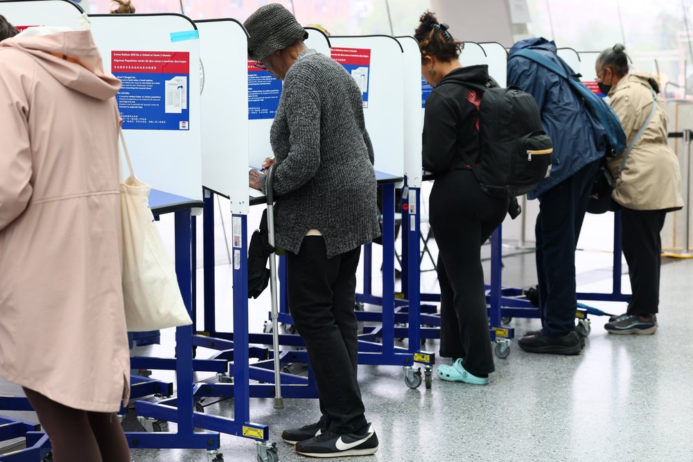 Voters in the booths.