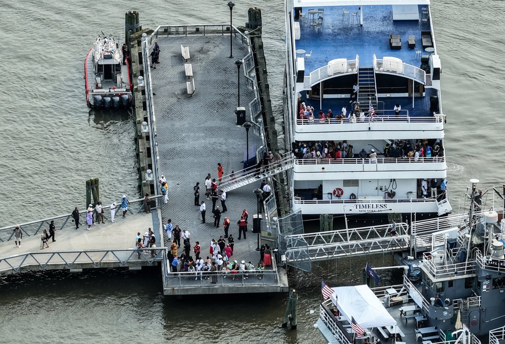 A yacht hit dock in Hudson River, New York City. Police said dozens of people were treated for minor injuries.