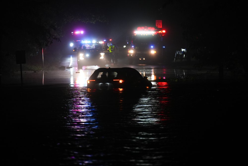 A car is stuck in flooded waters in Plainfield, New Jersey, on July 15, 2025.