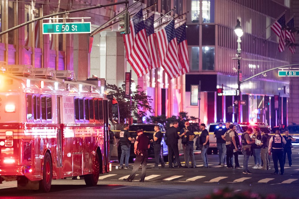 Law enforcement officials respond to the mass shooting in Midtown on July 28, 2025.