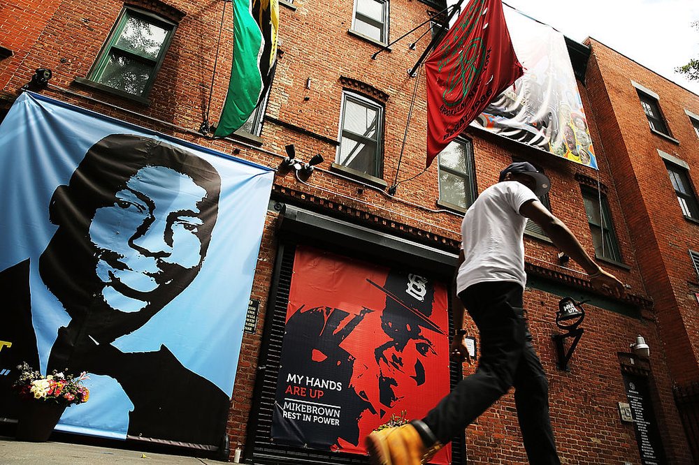 Memorials for 43-year-old Eric Garner (left), killed in an encounter with police on Staten Island on July 17, 2014, and 18-year-old Michael Brown, killed by police in Ferguson, Missouri, on Aug. 9, 2014, erected outside of filmmaker's Spike Lee's 40 Acres offices on Aug. 15, 2014. The deaths helped spur the Black Lives Matter police reform movement, which peaked when George Floyd was killed by police in Minneapolis in 2020.