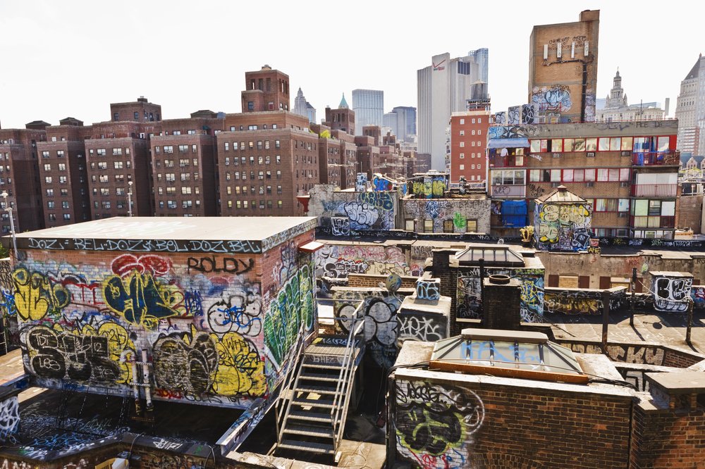 Graffiti covers a series of buildings in Chinatown.