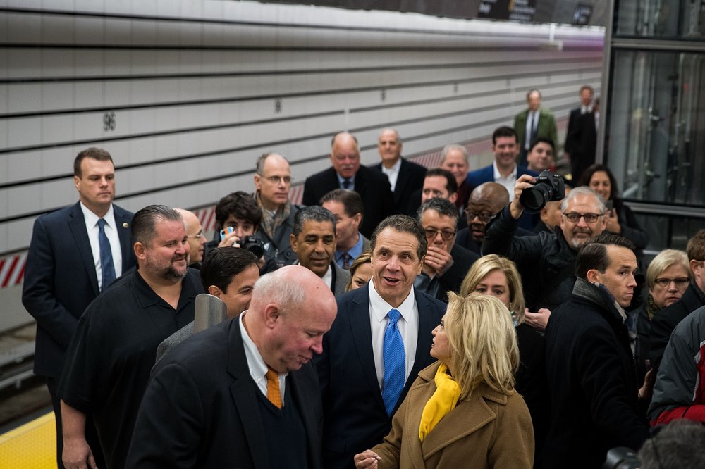 Former Gov. Andrew Cuomo in a crowd of people ahead of the opening of three new subway stations on Second Avenue.