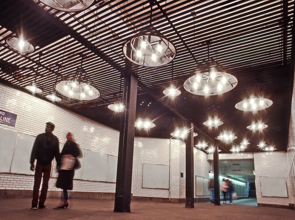 A photo of Astral Grating (1987) ã Nancy Holt, temporary de-installed. Commissioned by Metropolitan Transportation Authority Arts & Design.