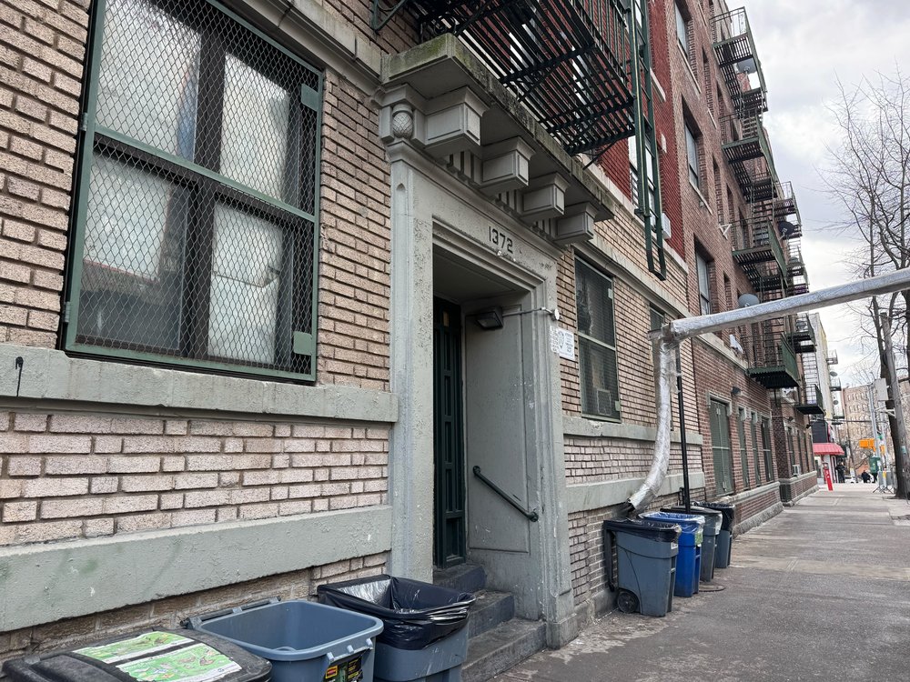 outside of the building on Ogden Avenue in the Bronx where federal officials conducted an immigration enforcement action