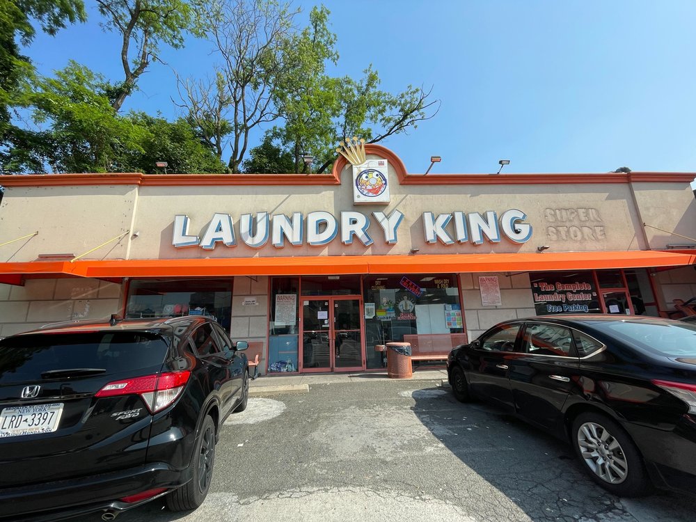 The Laundry King laundromat in Sheepshead Bay where police say a man was killed and his son injured on June 22, 2025.