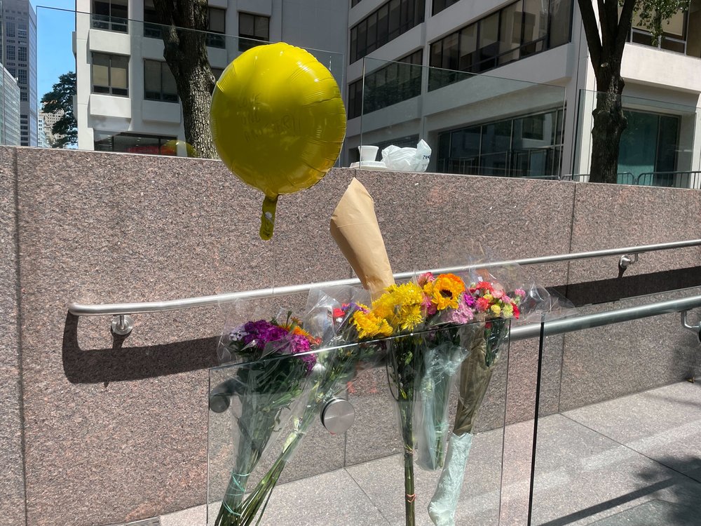 A small memorial for the victims was set up outside the building on July 29, 2025.