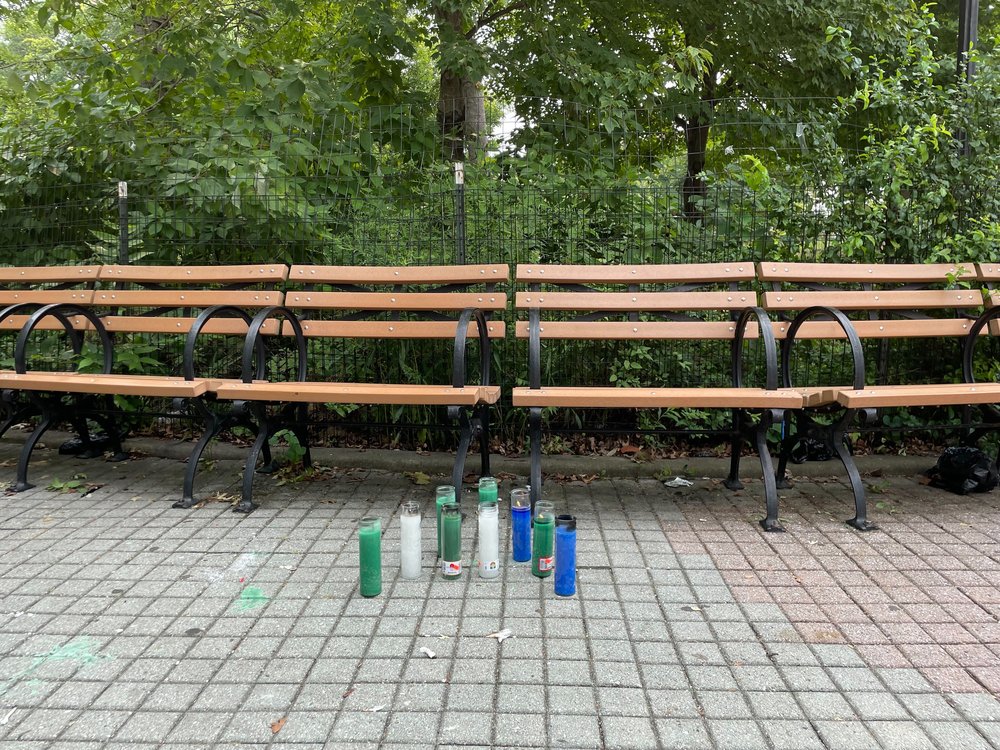 Photo of candles marking the spot where 14-year-old Angel Mendoza was stabbed in Williamsbridge Oval Playground in Norwood.