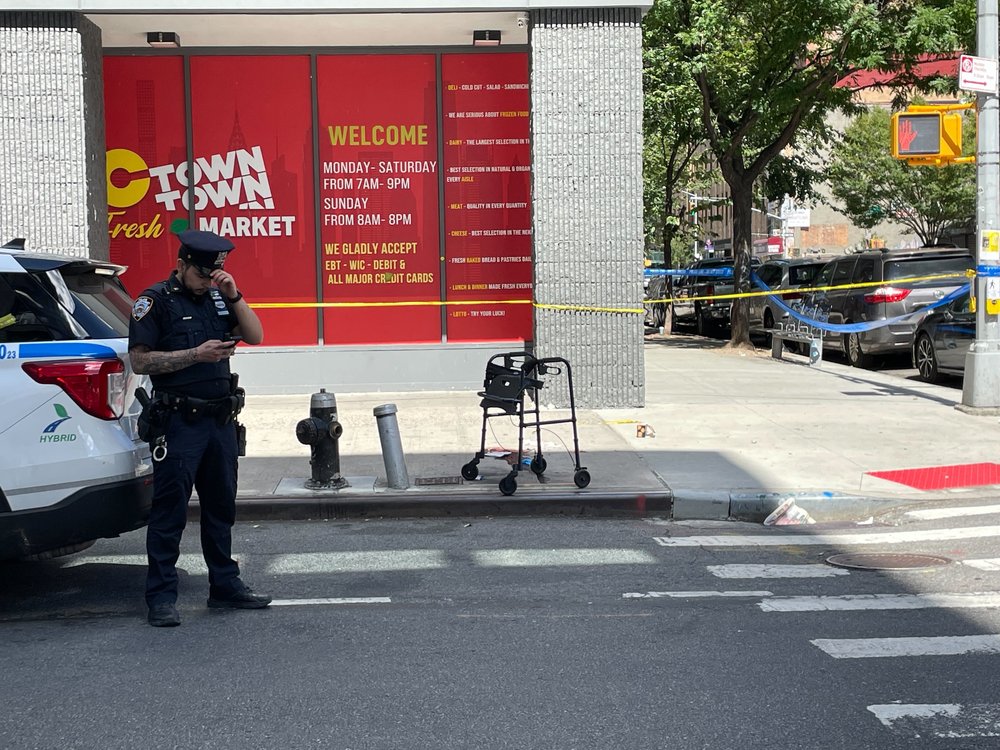 A walker is left at the scene of a shooting at East 110th Street and Madison Avenue in East Harlem on Aug. 27, 2025.