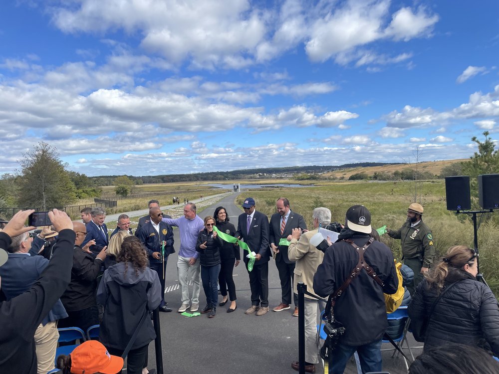 Mayor Eric Adams and other elected officials cut the ribbon on the first section of Freshkills Park, which is built atop Staten Island's old landfill.
