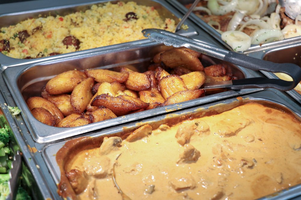 Food arranged in dishes, buffet-style.