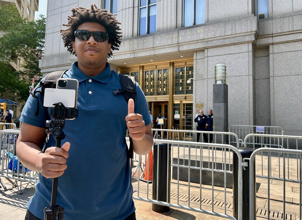 Trevor Harris said he’s been leaving his apartment in the Bronx around 6 every morning to record Combs’ family as they walk into court.