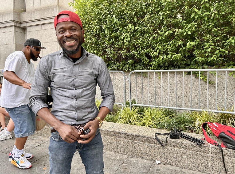 Samuel Wilson came all the way from Las Vegas to cover the trial. He said he plans to stay in New York.