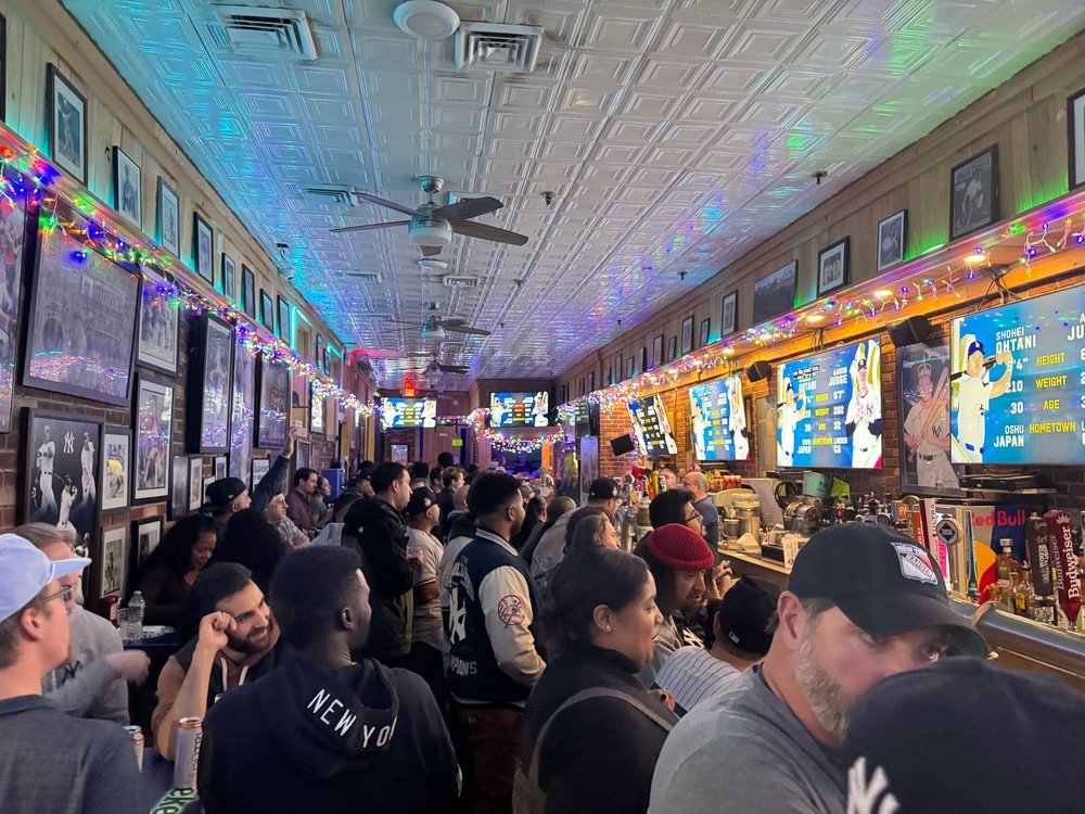 The crowded inside of the Yankee Tavern in the Bronx on the first night of the 2024 World Series.