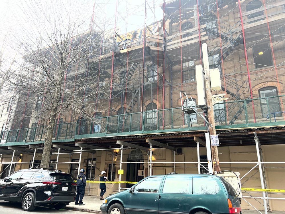 Scaffolding outside a Brooklyn building collapsed on Tuesday, injuring two people, according to officials.