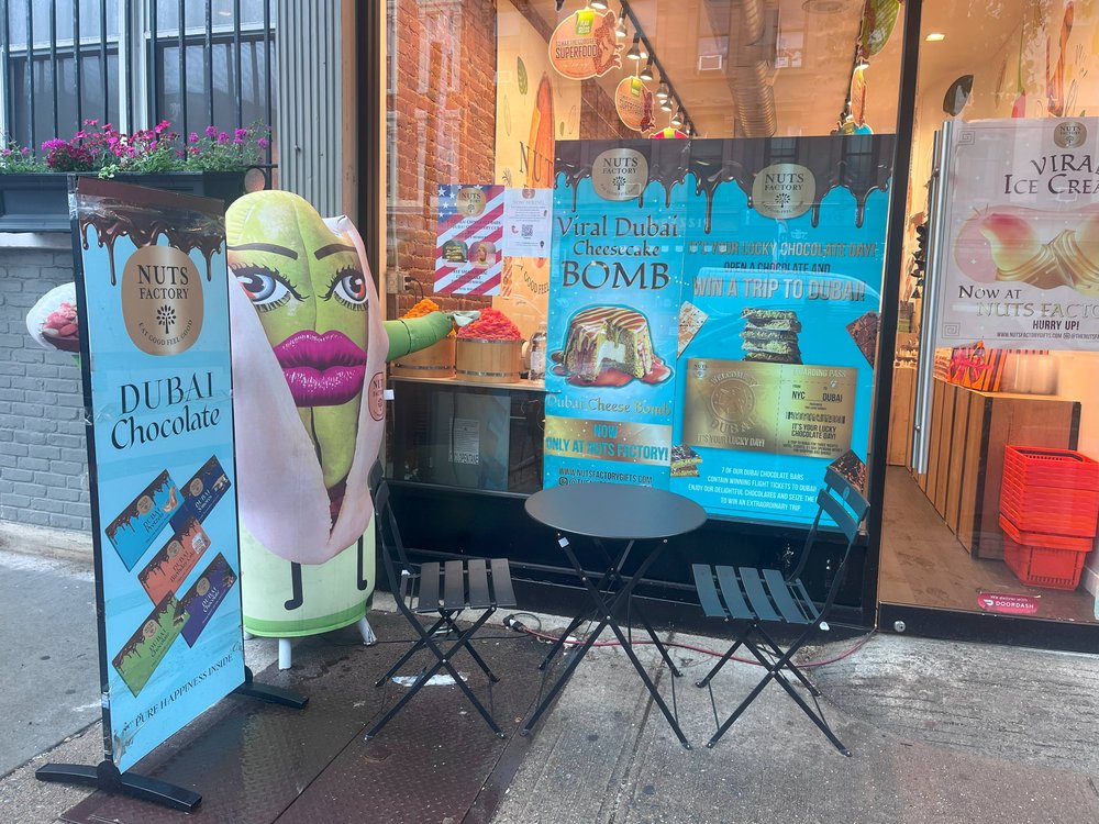 A banner advertising Dubai chocolate in New York City.