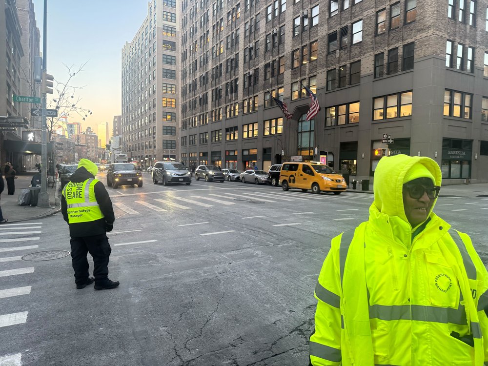 Varick Street traffic directors standing in front of an unusually calm congestion.