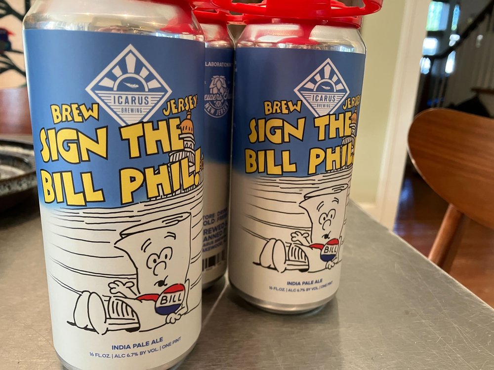 Beer cans labeled "Sign the Bill Phil!"