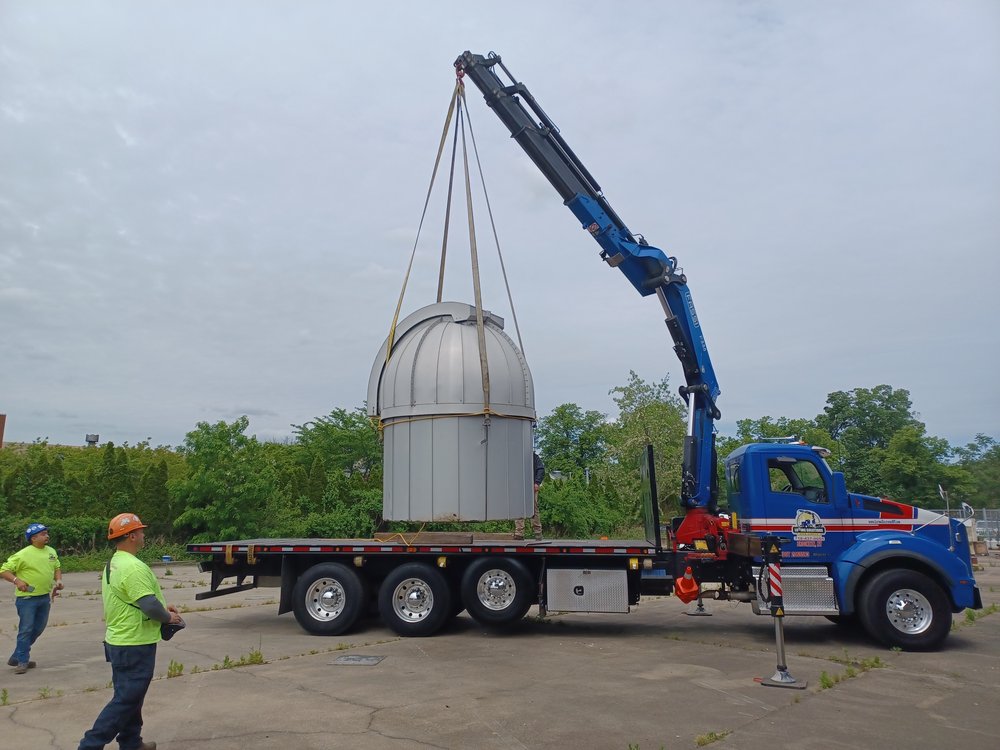 A big rig loads up the half-ton observatory, May 24th, 2022.