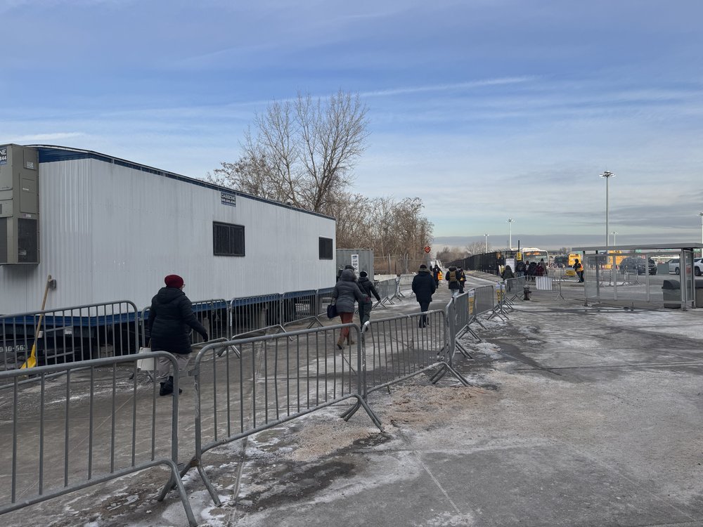 Rockaway riders walking to shuttle buses.