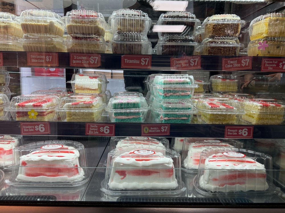 Cakes in the display at Valencia Bakery.
