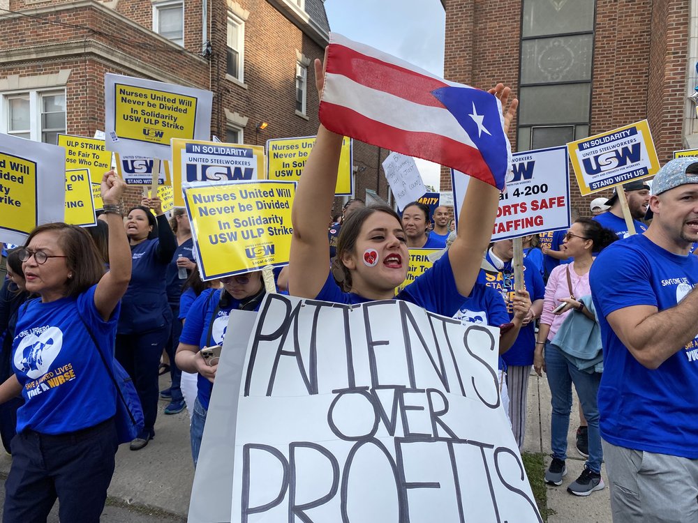 Nurses protest outside Robert Wood Johnson University Hospital in New Brunswick, New Jersey