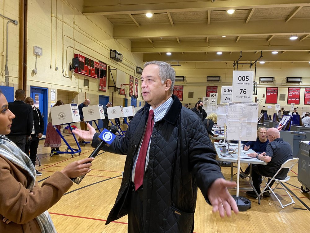 Fred Umane, a Manhattan GOP commissioner for the city Board of Elections, is being interviewed inside the Robert Wagner Middle School, a poll site on Election Day.