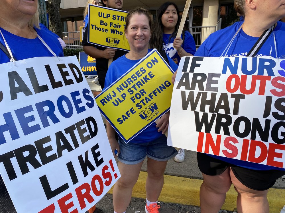 Nurses protest outside Robert Wood Johnson University Hospital in New Brunswick, New Jersey