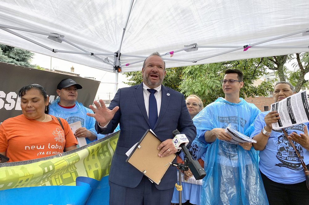 New Jersey Department of Labor Commissioner Rob Asaro-Angelo and others at press conference in Elizabeth, New Jersey.