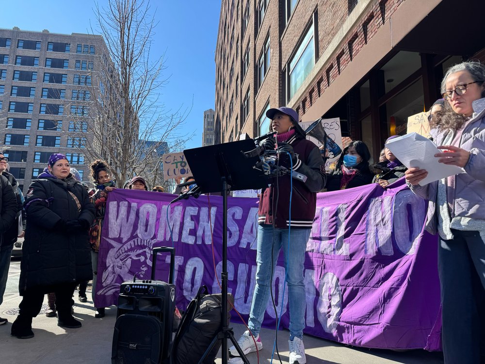 About 50 women protested former Gov. Andrew Cuomo outside labor rally Sunday.