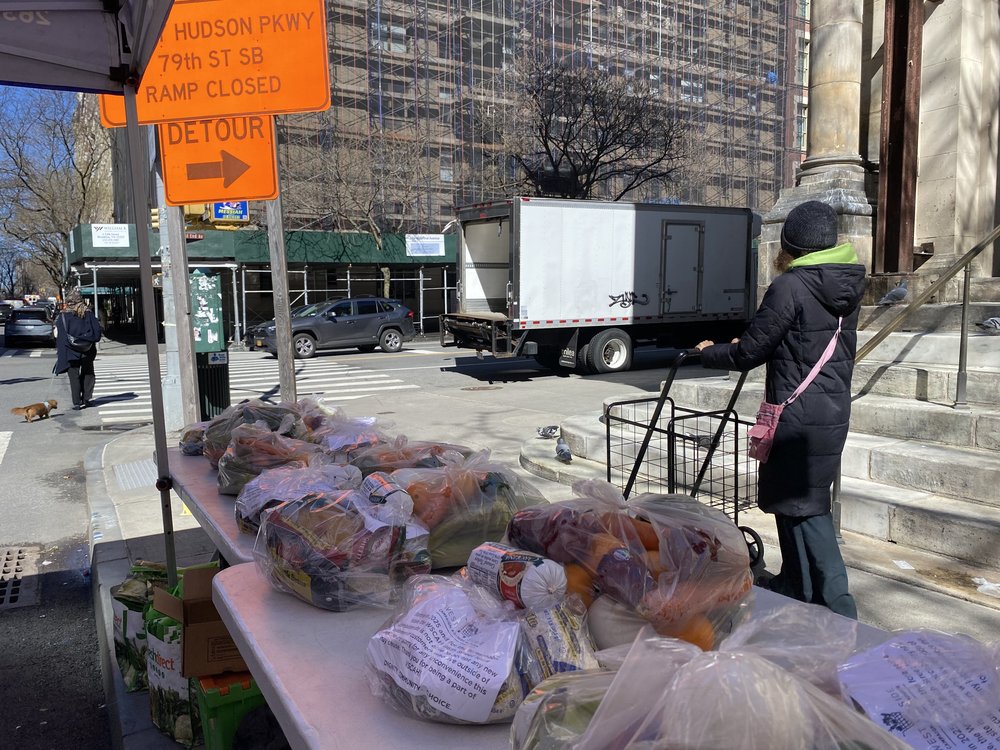 Volunteers at the West Side Campaign Against Hunger distribute bags of fresh produce to New Yorkers on the corner of 86th Street and West End Avenue on March 18, 2025.