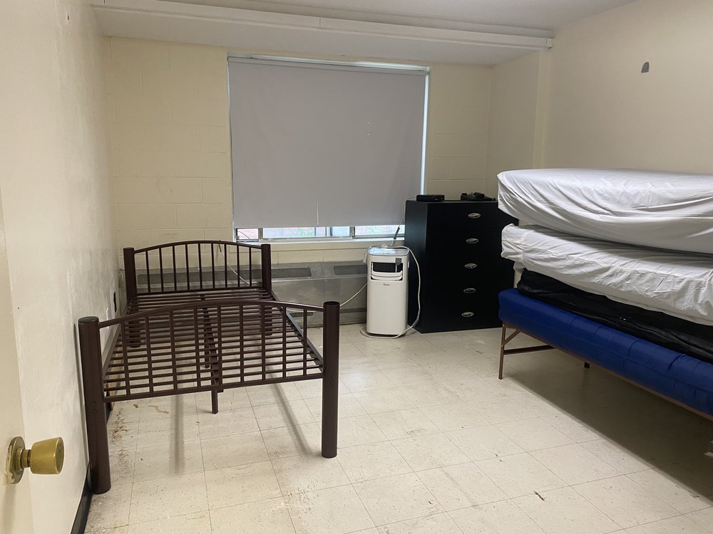 The old WIN family homeless shelter sits next to the new Ruby Dee facility.
